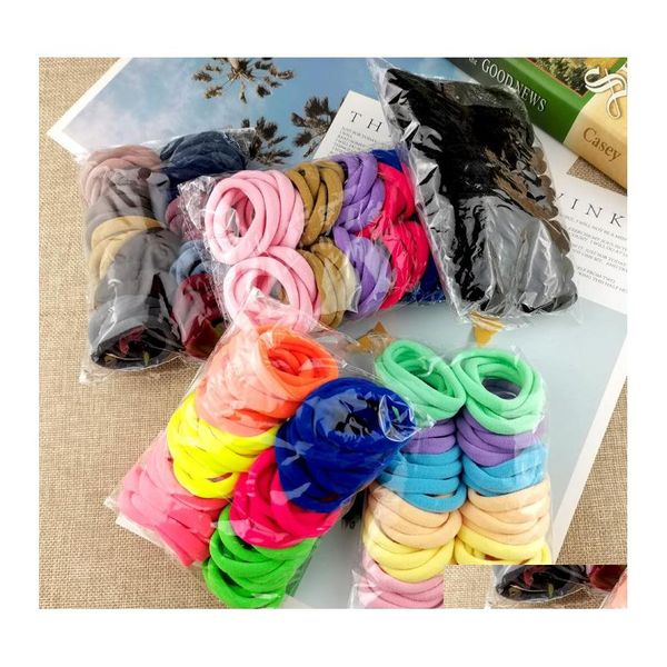 Bande de cheveux 50pcs / sac filles couleur unie grand support de queue de cheval en caoutchouc gomme couvre-chef bandes élastiques accessoires de fille coréenne ornements goutte D Dhml5