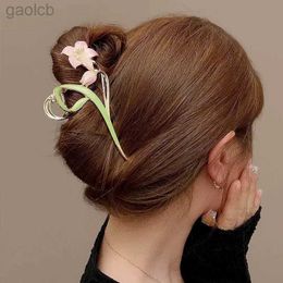 Haarclips Brurettes 2024 Nieuwe vrouwen Elegante Lily Metal Hair Claw Clip Exquise Tulip Flowers Barrette Crab Hairgrips Fashion Women Hair Accessoires 240426