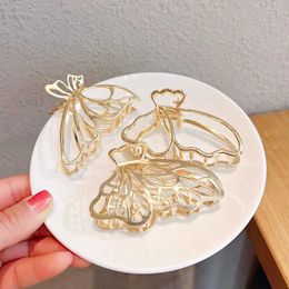 Haarclips Bronrettes vlinder klauw holle zinklegering mooie gouden clip dames mode -accessoires nieuwe hoofddeksel 2023