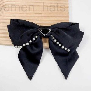 Haarclips Bronrettes Designer Simple Designer Solid Color Luxury Brand Letter Afdrukken Big Bowknot Hairspin Satin Fabric Pearl Hairclaw EFSM