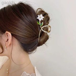 Clips de cheveux Barrettes nouvelles femmes Metal Hair Claw Elegant Gold Fleurs Clips de cheveux Barrette Crab Bande Ponytail Clip Couvoiries Accessoires de cheveux Tiara 240426