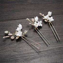 Haarclips Bronrettes Wit Porselein Bloem Brutale pinnen Parels Parels Dames Sieraden Handgemaakte bruiloft Haarspelden Accessoires