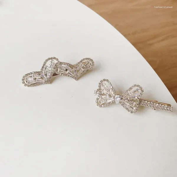 Pinzas para el cabello Corea del Sur Luz de lujo Joyería de mujer Circón con incrustaciones Temperamento Bowknot Hueco Diamante Horquilla Moda Elegante Sombreros