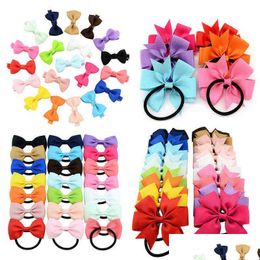 Bands de caoutchouc à cheveux 10pcs / lot Accessoires pour enfants Bowknot Elastic Colorf Scrunchies Fashion Bandons Girls Ponytail Holder AA220323 Drop Dhnmh