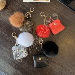 Llavero con bola de pelo, billeteras, soporte para auriculares, cuero PU, mochila de moda, accesorios, Mini bolso colgante
