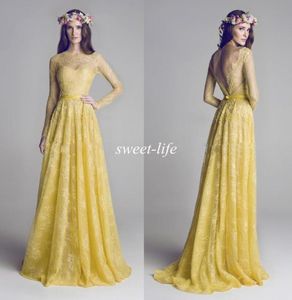 Hamda Al Fahim 2022 Robe de soirée avec manches longues à manches transparentes Bateau Backless Aline Yellow Lace Robes formelles