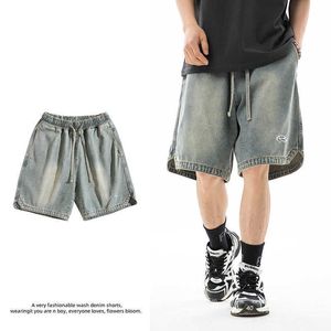 Han Lu Mens Hem Triangle Split Design Denim Shorts pour l'été Nouveau pantalon en vrac brodé à la mode