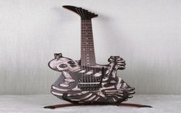 Sculpté à la main J Frog George Lynch Skull and Bones Guitare électrique entièrement flottant véritable Floyd Rose Tremolo Touche en ébène Korea2910914