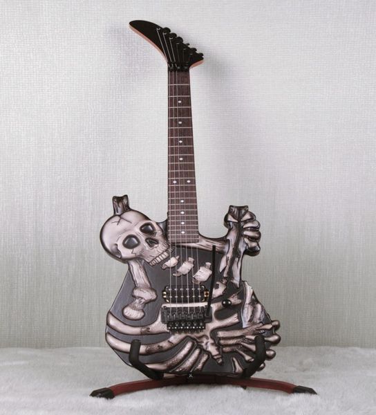 Hand sculpté j grenouille George Lynch Skull and Bones Guitare électrique Full flottante véritable Floyd Rose Tremolo Ebony Finderboard Korea8065590