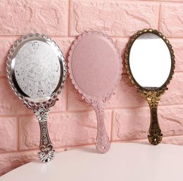 Hand op zoek glazen retro patroon ijdelheid verlichte make-up spiegel Koreaanse stijl prinses compact spiegels Draagbare handvat SN2646
