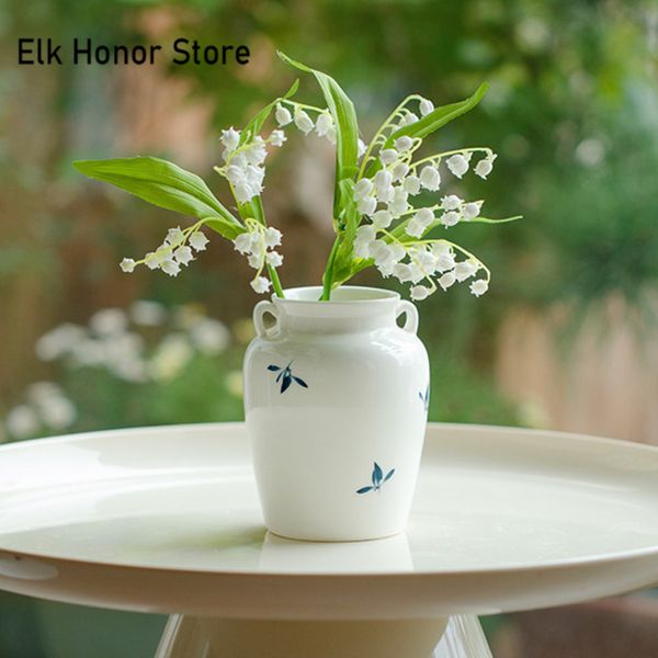 Papillon peint à la main orchidée en céramique fleur pot créatif arrangement de fleurs en porcelaine blanche en porcelaine blanche arrangement de fleurs