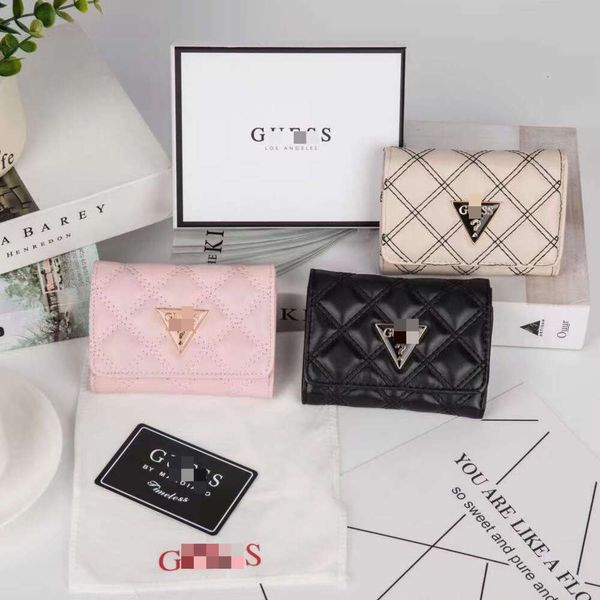 Handbag Designer 50% de réduction sur la marque chaude Bourse pour femmes Nouveaux motifs de diamant simple portefeuille courte couleur solide zéro sac de document argent