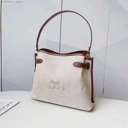 Le créateur de sacs à main vend des sacs de marque féminine chaude à 55% de réduction de coton et de toile en cuir Hanna Letter Sand à glissière Sac