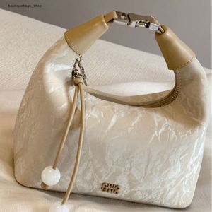 Les concepteurs de sacs à main sont des vendeurs chauds nanfeng taozhi yaoyao sac fourre-tout à main pour aller à la petite épaule