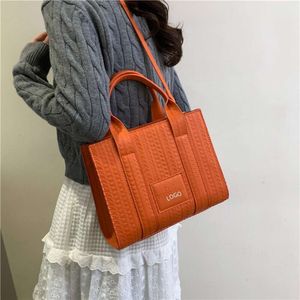 Les concepteurs de sacs à main vendent des sacs féminins à partir de marques à prix réduits le sac fourre-tout Nouveau petit petit