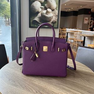 Handbag Platinum Julie achète la première couche Cowhide Lychee Match Fashion Messenger grand sac sac pour femmes sac à main