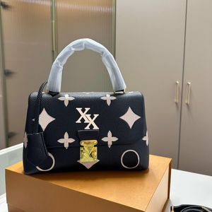 Handtas damesschoudertas madeleine tas gemaakt van echt lederen materiaal met gesp baksluiting ontwerp voering zipperzak mode crossbody tas