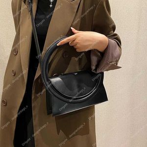 Bolsos Bolsos Top Barato 2024 Femme Store Marca 90% para mujeres Off Sac Venta al por mayor Embrague de moda Mango redondo grande Pu Bolsa Diseño de lujo Cuero Lady Crossbody Shuolder