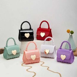 Handtassen Nieuwe Solid Color Fresh Sweet Chain Mini PVC Jelly Dames Bag Fashion Tien Font Lipstick Small Bag Y240523