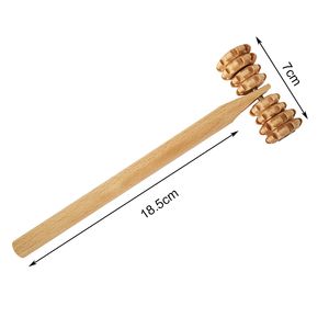 Rouleau de massage en bois d'outils de thérapie en bois tenus dans la main pour le corps