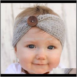 Handgemaakte babybreien Haakhoofdband Fashion Fashion Boys Girls Hoofdbanden oorwarmer met knopkinderen Haaraccessoires E1QRM EVWQX