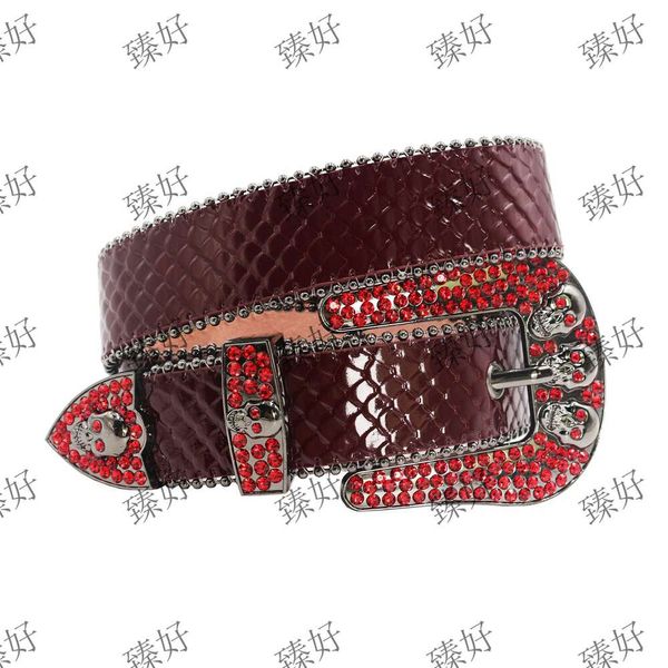 Cinturón de diamantes hecho a mano tendencia callejera nuevo cinturón versátil calavera diseño de piel de serpiente hebilla de aguja de aleación para hombres y mujeres