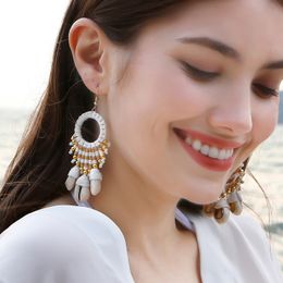 Handgemaakt doe -het -diy touw gevlochten Bohemensconch Hoop oorbellen Lange Tassel Shell Earring Vrouw Dungel oorbellen