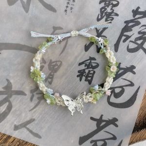 Handgemaakte nieuwe Chinese vlinderarmband groene bloem vers zoete hoogwaardige zintuigen weven kleine luxe hand sieraden vrouwelijk