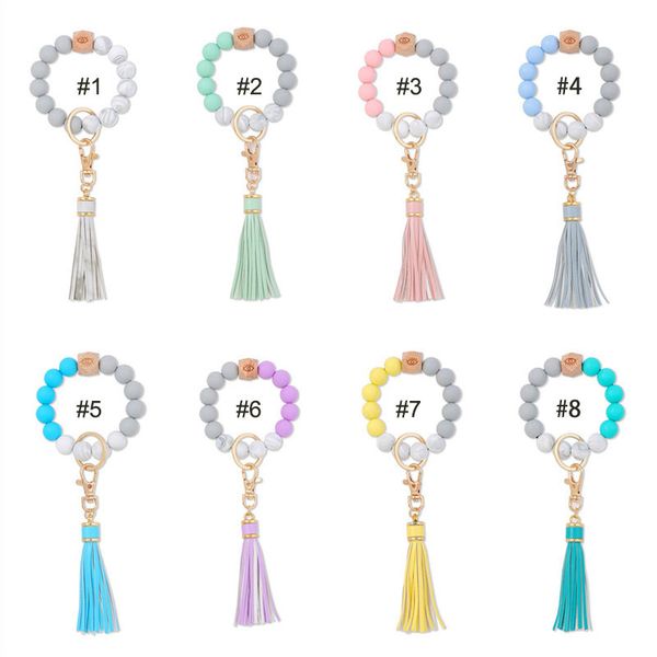 Perles de silicone étirées à la main BLINE Party Keychain Tassel Bracelet Bracelet Bracelet Pu Cuir PU Porte-clés Femme Bois Bois Bracelets Femmes Girl