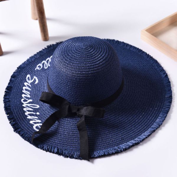 Letra de tejido hecho a mano Sombreros de sol para mujer Cinta negra con cordones Sombrero de paja de ala grande Sombrero de playa al aire libre Gorras de verano Chapeu Feminino C0305 Y0910