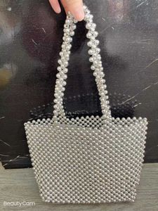 Sac de perles en dentelle blanche tissé à la main, sac de perles portable à la mode et polyvalent 240402