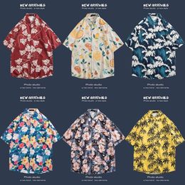 Chemise hawaïenne Shirt à manches à manches à manches courtes à manches à manches à manches à manches courtes Hainan Island Beach Shirt Sanya Xia Wei Feng Thai Tourist Male Couple de veste décontractée