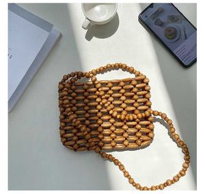 HBP Non-Brand 2024 Zomer Koreaanse Versie Gevlochten Ontwerp Crossbody Tas Kleine Nieuwe Houten Kraal Sling Womens Schouder Mode Hol