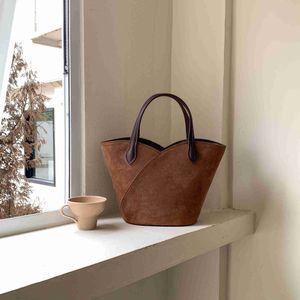 HBP Non-Marque Design Tendance Avancée Sac À Main Faux Daim Décoration Grande Capacité Sac Fourre-Tout Style Rétro Seau pour Femmes