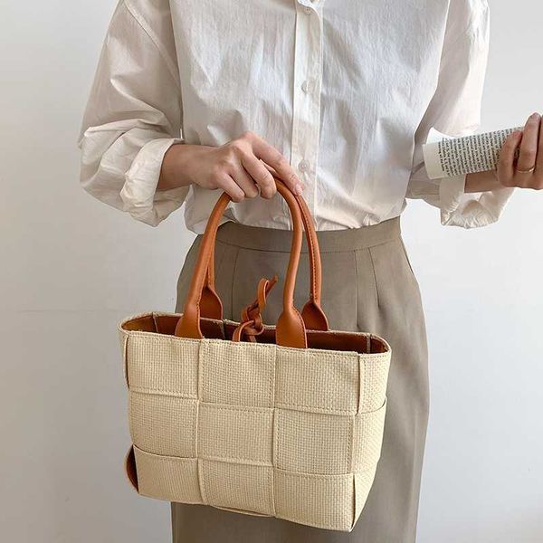 HBP Non-Brand Venta al por mayor Bolso de mano de ganchillo Bolsos de mujer de moda Bolsos de nudo tejido para mujer Tendencia elegante Bolso de mano de punto creativo para mujer