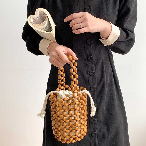 HBP Non-Brand Venta al por mayor Bolsos de mano para mujer Monederos y bolsos de moda para mujer Bolso de cuentas de madera Perlas Mini bolso de cubo de punto