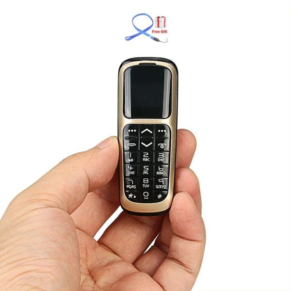Écouteur V2 quad band bluetooth dialeer mini téléphone mobile 0,66 pouce carte SIM SIM FM Radio Cell Phone (ne pas prendre en charge la carte mémoire)