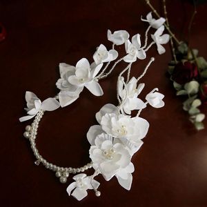 Hoofddeksels bruid kralen haardecoratie witte satijnbloem parelbanden hoofdband bruiloft sieraden hoofdstukken