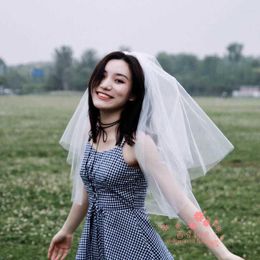 Coiffures certificat voile robe de mariée courte femme mariée style coréen coiffure simple Mori blanc