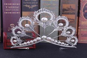 Tocados EA Rhinestone Tocado nupcial Perlas de plumas de pavo real Nudo de corona grande Accesorios para vestido de novia Coronas Novia Tiara7651882