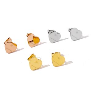 Hartvormige mode charme oorbellen vrouwelijke gravure g brief merkontwerper ontwerp geometrische oorbellen luxe sieraden valentijnsdag cadeau voor vriendin