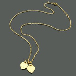 collier en forme de coeur bijoux de créateur classique pour femmes collier en acier inoxydable matériau non allergique de haute qualité pour tenue quotidienne élégant article de beauté
