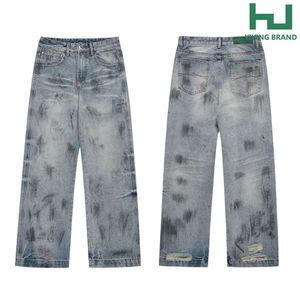 Zware industrie handgeschilderde versleten, gewassen en gesneden in stukken ontwerp sense jeans, heren en dames rechte buis losse basisversie veelzijdige broek