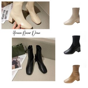 Bottes de créateur à talons à talons Softs High Boots Automne Hiver Hiver Talon grossier Chaussures Femmes 100% réelle en cuir Zipper Letter