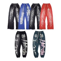 hellstar broeken designer broeken vintage cargobroeken joggers joggingbroeken cargos joggingbroek met graffiti print jogger pantalon cargo splash inkt High Street hiphop Koppels