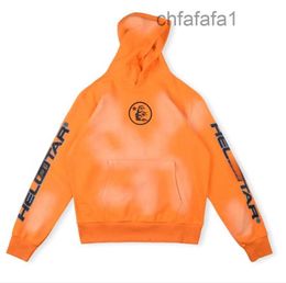 Hellstar Studios Hip Hop Rapper Street con capucha Hombres Diseñador Sudaderas con capucha Conjunto para mujer Sudaderas Jersey Naranja Lavada Sudadera con capucha con cerebro Ropa para hombre Deportes Ru ZO5Z