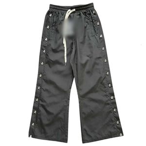 Pantalons de créateurs Hellstars Pantalons pour hommes de qualité supérieure Pantalons pour hommes Pantalons de survêtement pour hommes et femmes Chemin vers le paradis Pantalons à boutons en nylon avec cordon de serrage long