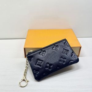 HH KEY POUCH POCHETTE Monedero Monedero Negro Relieve CLES Diseñador Moda Mujer Hombre Anillo Titular de la tarjeta de crédito Mini bolso Encanto Accesorios M62650