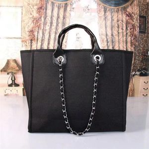 Hallo Sale Hoge kwaliteit nieuwe luxe designer vrouwen schoudertassen lederen canvas tas beroemde trekkoord handtassen kruis body portemonnee zwarte strandzakken