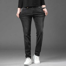 High 2023 End grijze veelzijdige jeans voor heren herfst elastische strakke passende en knappe straatmodemerk slanke fit broek